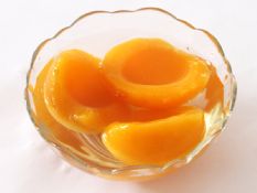Canned yellow peach in syrup